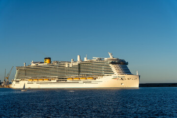 A large cruise ship is sailing in the ocean