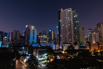 Fototapeta na wymiar Makati, Philippines - Stunning nighttime skyline of the Makati CBD as seen from Legasp Village.