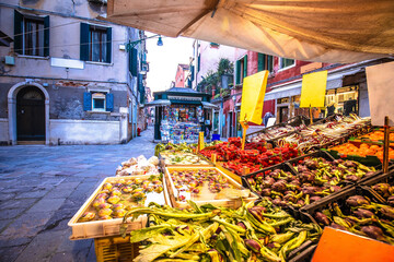 Fruit and vegetable stand in street of Venice view
