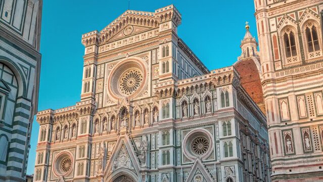 The front view of The Basilica di Santa Maria del Fiore timelapse which is the cathedral church (Duomo) of Florence in Italy. shadows moves on facade during sunset