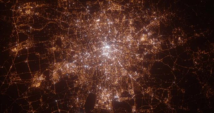Leipzig (Germany) aerial view at night. Top view on modern city with glow effect. Camera is zooming out, rotating counterclockwise