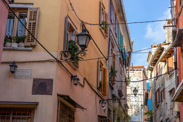 cityscape grisia street view in Rovinj Croatia with yellow houses doors and shutters