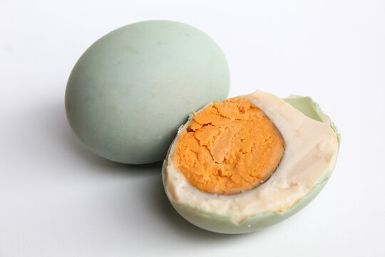 Halved salted egg, blue color shell from duck egg. Isolated on white background