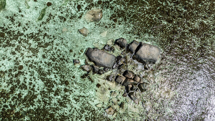 panoramic view from a drone of the sea bays and beaches on a sunny day of the Seychelles islands