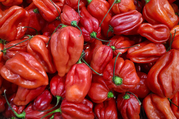 Stack of habaneros on a market stall