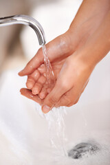 Person, water and soap on hands for cleaning in skincare, routine or grooming in home closeup....
