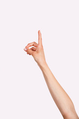 hand with pointing finger of a young woman - 753068532
