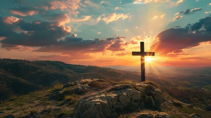 Cross on the hill - symbol of crucifixion of Jesus Christ. On beautiful sunset background.