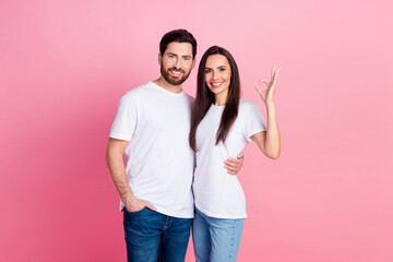 Photo portrait of lovely young couple hugging okey good quality dressed stylish white garment isolated on pink color background