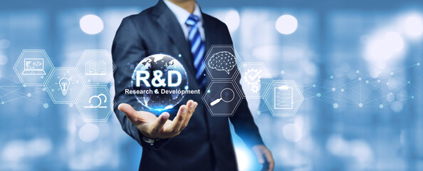 R and D research and development concept with businessman holding globe research icon for develop...