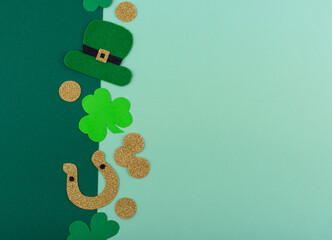 St. Patrick's Day concept with leprechaun hat, gold coins and horseshoe