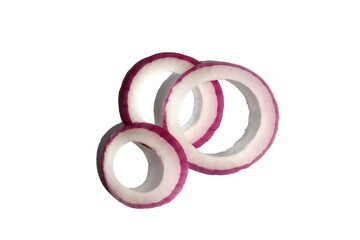 Purple onions sliced into rings lie on a white background.	