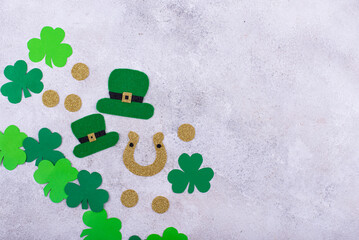 St. Patrick's Day concept with leprechaun hat, gold coins and horseshoe