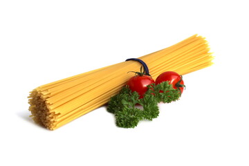 Dry spaghetti with tomatoes and herbs lie on a white background.	