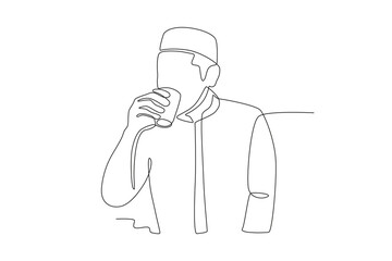 A man is drinking water