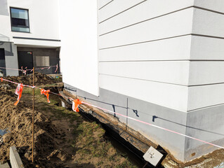 Ground work, block of flats, foundation waterproofing in residential area, groundworks