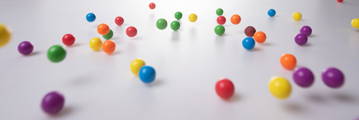 Colorful plastic balls resembling a rainbow,bouncing balls