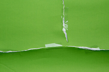 Torn green paper with transparent adhesive tape or strips,repair paper - 753103501