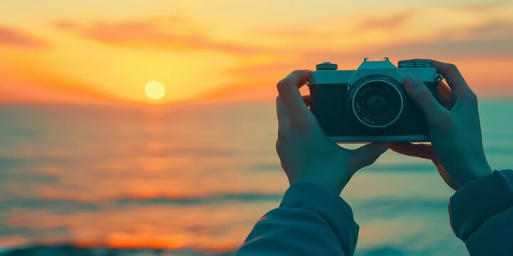 Friend is taking a picture with a camera by sunset, in the style of light-filled seascapes, clear edge definition, light teal and black, innovative, website.