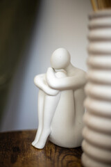figurine of thoughtful human as an interior element