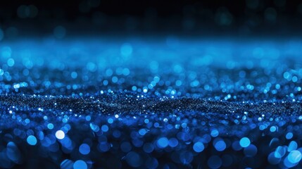 A sparkling blue background with a bokeh effect that resembles a starry night or a magical underwater scene, perfect for themed events or creative digital art.