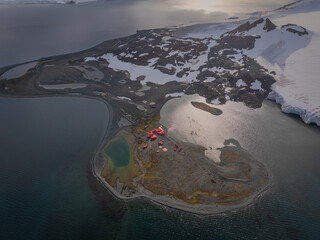 aerial view on the Antarctic continent of mountains and refuge