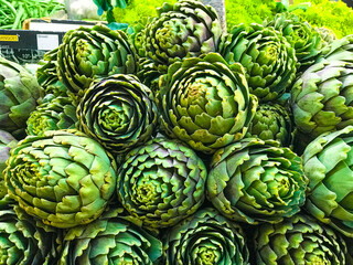 Fototapeta premium fresh artichoke in the market, photo for book cover with good definition