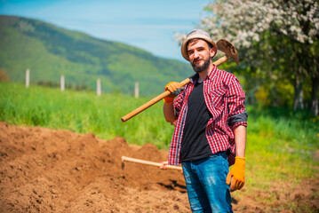 A farmer cultivates the soil, Manual cultivation and care of crops