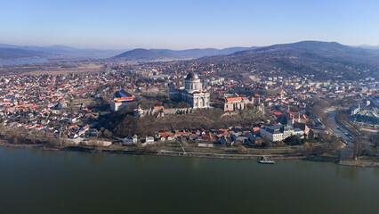 Naklejka premium Aerial photos of the Basilica of Esztergom in Hungary on a sunny winter day. Esztegomi Bazilika, Duna, Danube, Bridge, Hungary.