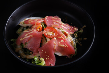 Japanese salad isolated in black background