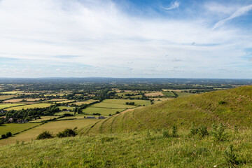Fototapeta na wymiar A view over the Sussex Weald from Fulking Hill, on a sunny summer's day