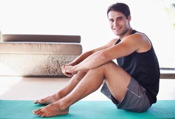 Yoga, mat and portrait of happy man on a living room floor for balance, routine or mental health...