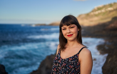 Beautiful woman tourist on the shores of Tenerife