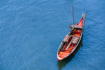 Fototapeta na wymiar Wine boat in Douro River, Porto, Portugal