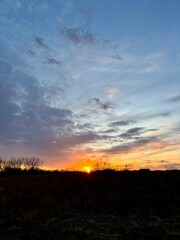 sunset in the sky with silhouette foreground 