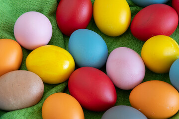 Fototapeta na wymiar eggs painted in different colors to celebrate Easte