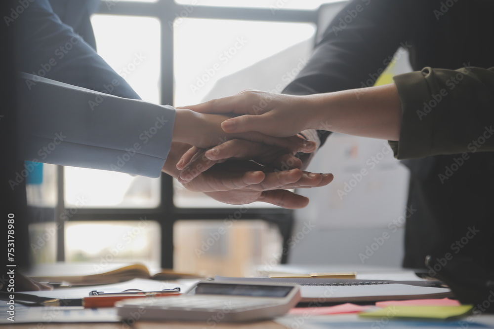 Wall mural meeting and greeting concept, two confident business handshake and business people after discussing 