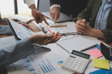 Co working conference, Business team meeting present, investor colleagues discussing new plan financial graph data on office table with laptop and digital tablet, Finance, accounting, investment.
