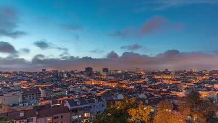 Panorama showing aerial view of downtown of Lisbon day to night transition timelapse, Portugal.