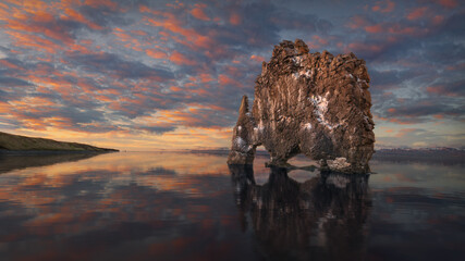 An unusual cliff on water in Iceland at spectacular sunset
