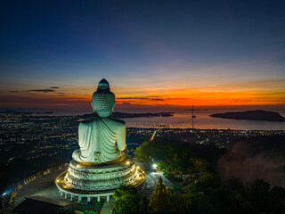 .aerial view amazing red light at horizon in twilight at Phuket big Buddha..bright red sky at...