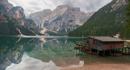 Famous mountain lake Braies at dawn in Dolomites