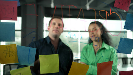 Professional business people discuss about creative marketing idea in modern office. Business team...