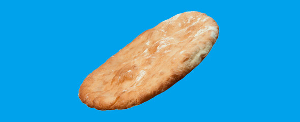round georgian pita bread on a blue background. round flat bread on a light surface	