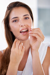 Health, dental and portrait of woman with floss for grooming, wellness and clean routine for...