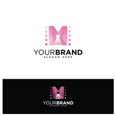 Elegant letter M with strip film and spot light for film production