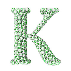 Symbols made from green soccer balls. letter k