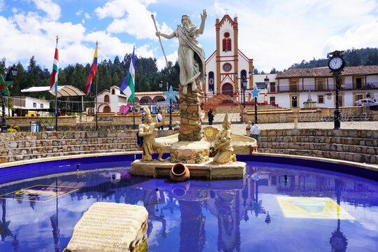 Cu&iacute;tiva, Boyac&aacute;, Colombia -December 28, 2023: Sculpture of Bochica, Master of the Muisca culture, in the main square of Cu&iacute;tiva. Distant Shot.