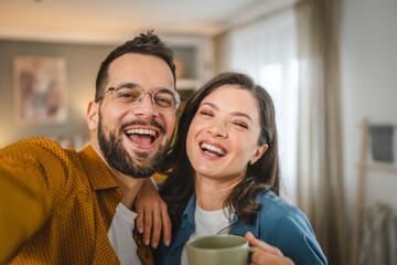 Fototapeta premium self portrait selfie of happy couple husband and wife at home