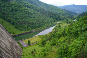 Beautiful landscape of Izvorul Muntelui lake at the hydroelectric dam in Transylvania. A view of Bicaz Dam in Romanian Carpathians, Europe